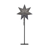 Modern, skandináv stílusú, 85 cm magas, szürkeszínű papírból készült, csillag formájú karácsonyi dekorációs lámpa fém talapzaton.